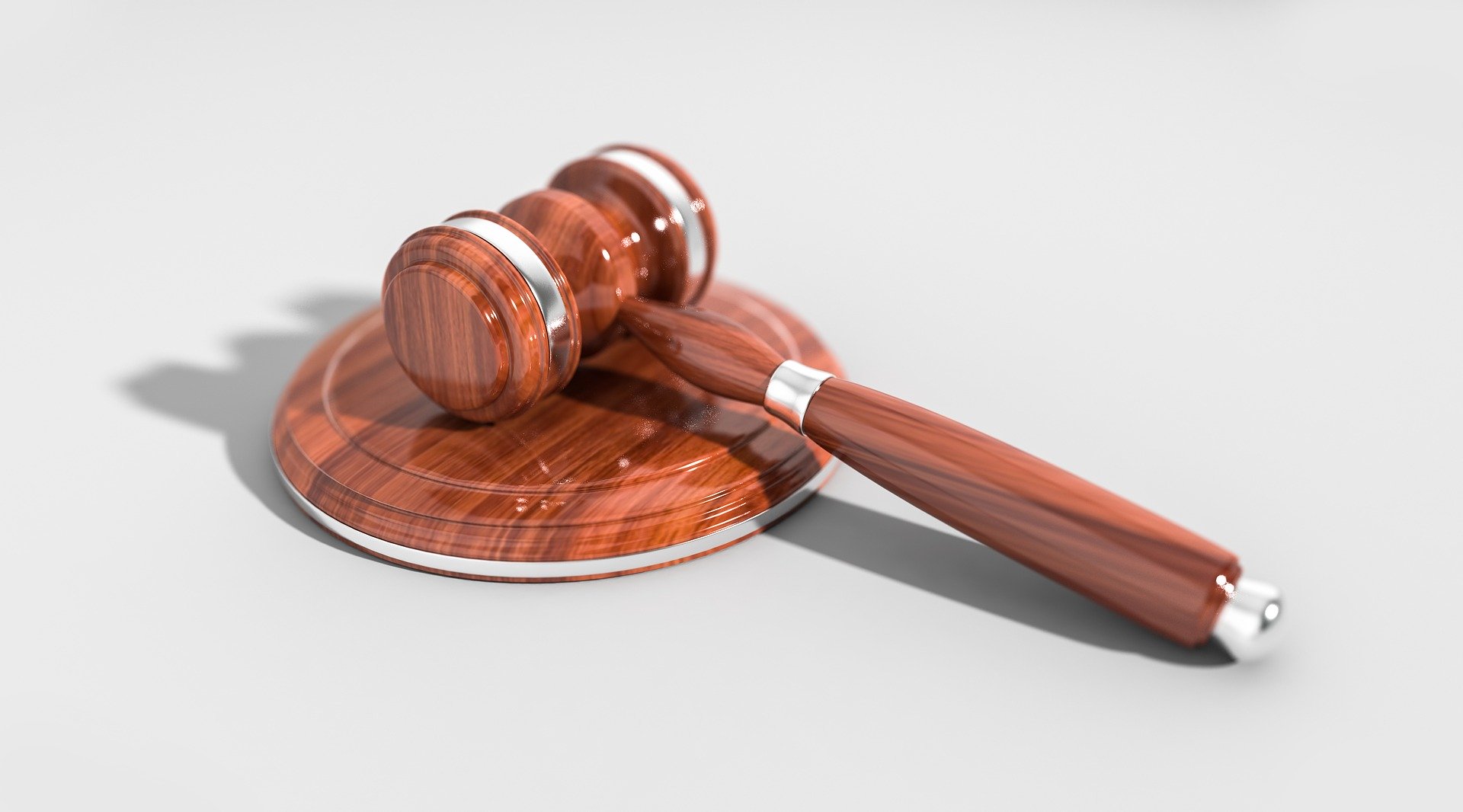 This page is about the terms of service from RdyGo LLC. The picture is of a Gavel seen in a courtroom.